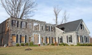 Public adjusters reviewing property damage insurance documents